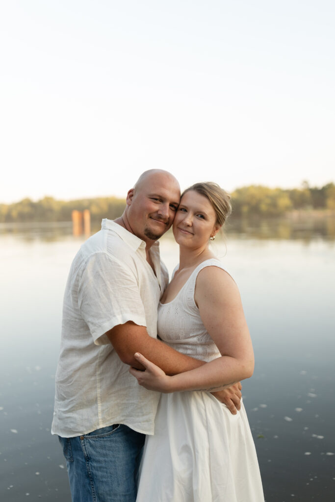 Couple in the water at Wildcat Bluff Recreation Area in Vinton, IA.