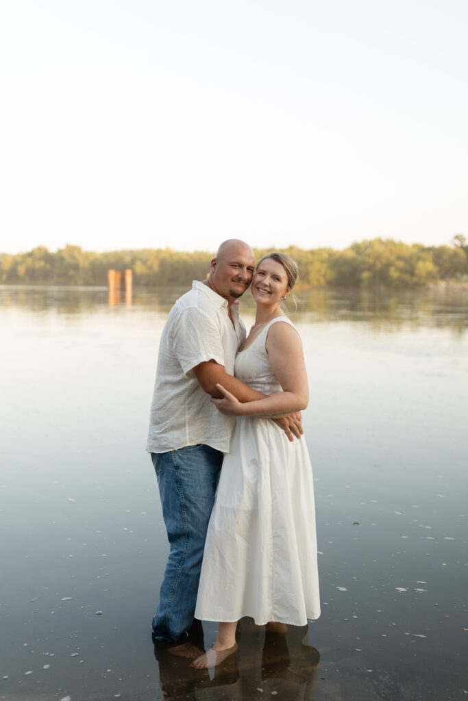 Couple in the water at Wildcat Bluff Recreation Area in Vinton, IA.