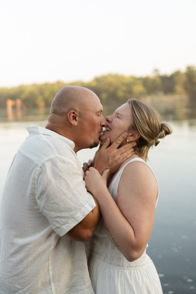 Couple in the water at Wildcat Bluff Recreation Area in Vinton, IA.