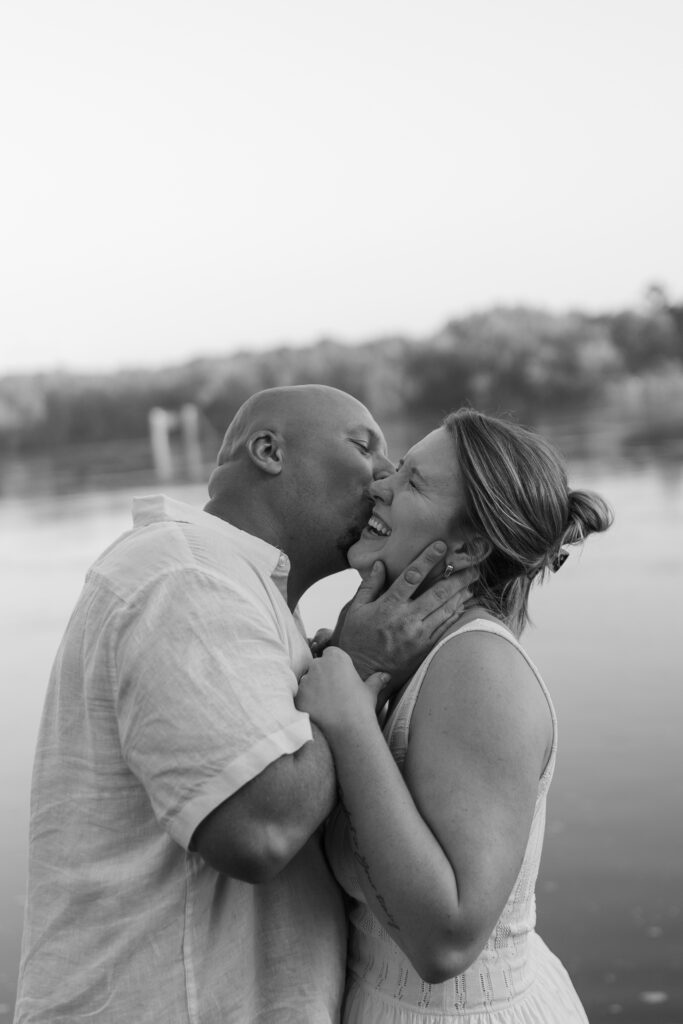 Black and white photo of a couple in the water at Wildcat Bluff Recreation Area in Vinton, IA.