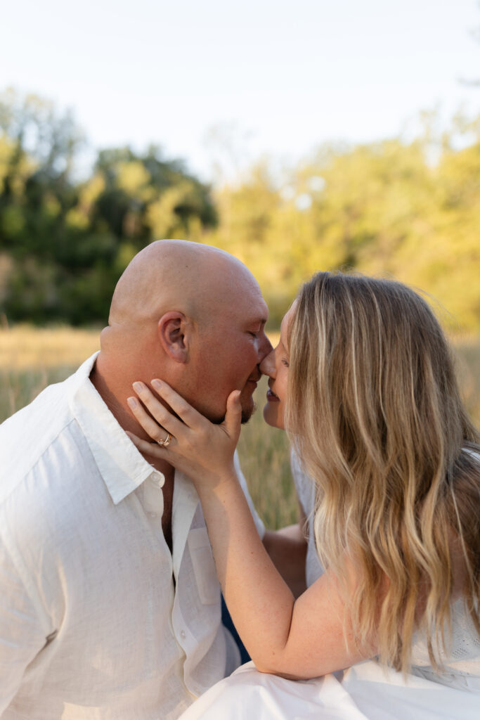 Couple during engagement session at Wildcat Bluff Recreation Area in Vinton, IA.